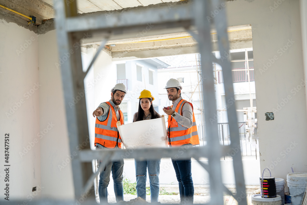 Engineer and technician team discussing in new home construction site.,Colleagues working together,C