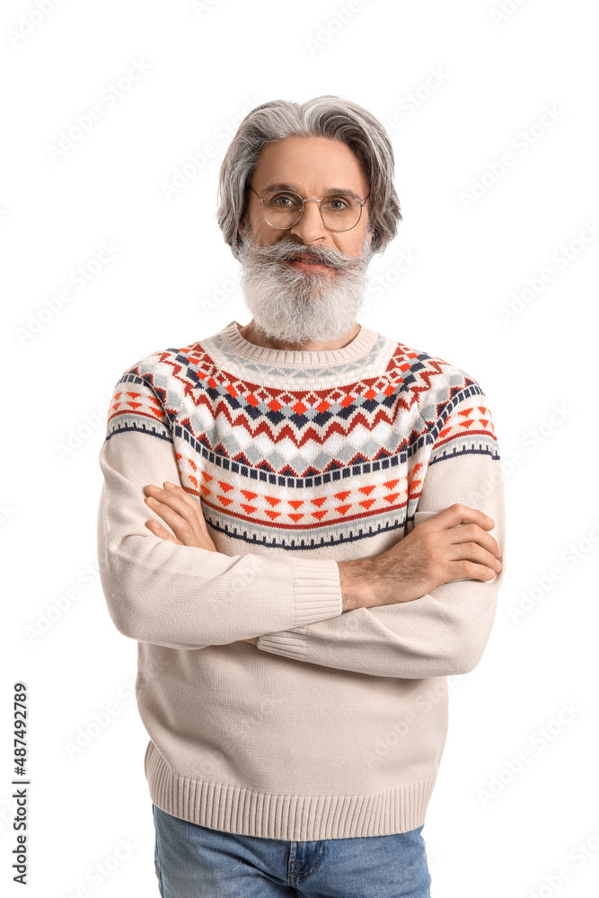 Handsome senior man in knitted sweater on white background