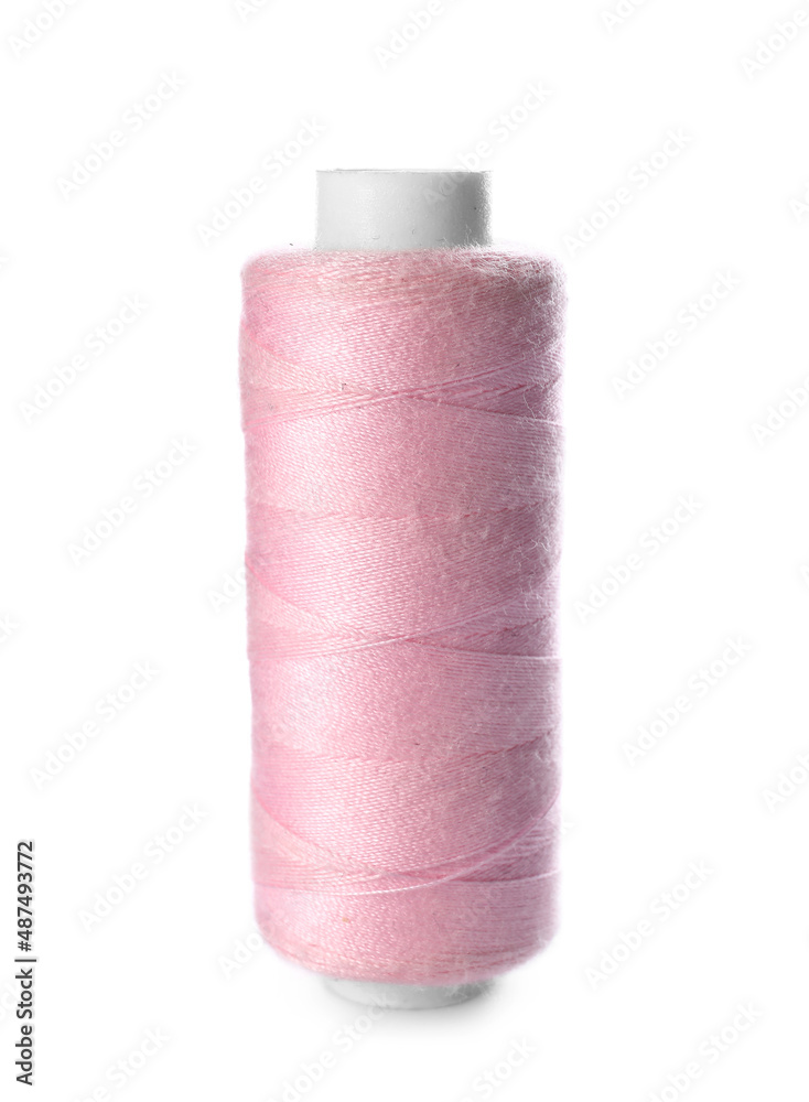 Bright sewing thread spool on white background