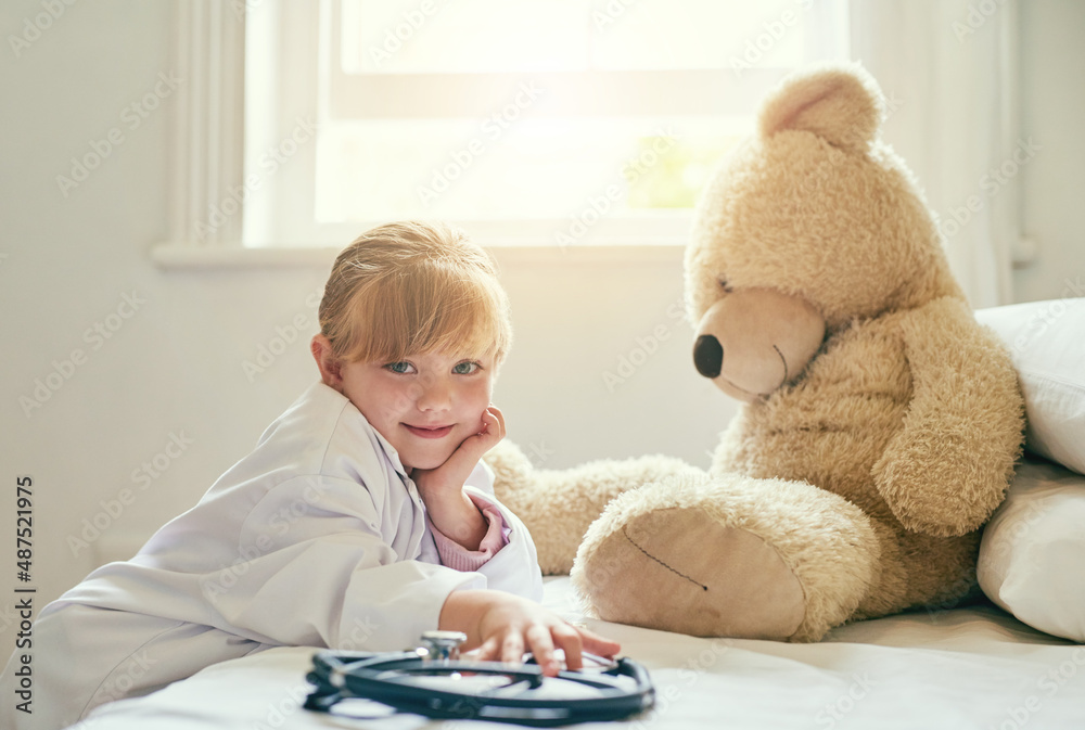 I ant to help you with your heath. Shot of an adorable little girl dressed up as a doctor and treati