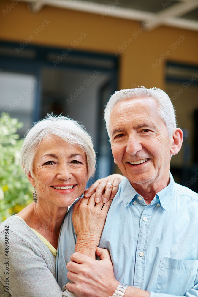 Still in love after all these years. Portrait of a happy senior couple outdoors.