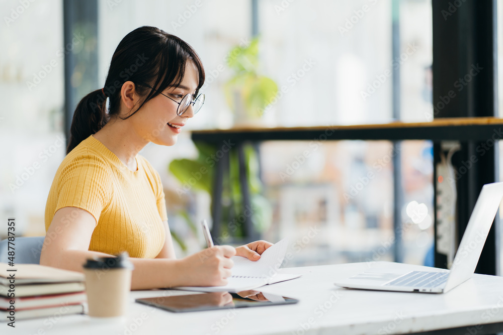 Skilled female software developer working on freelance use code libraries to simplify the transcript