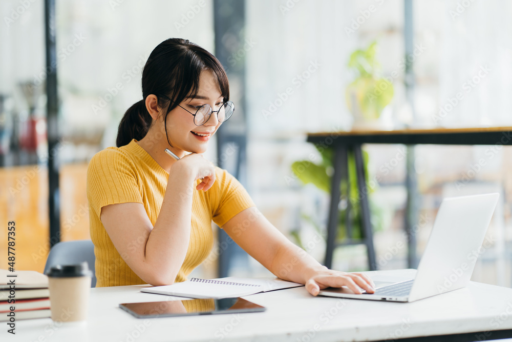 Skilled female software developer working on freelance use code libraries to simplify the transcript