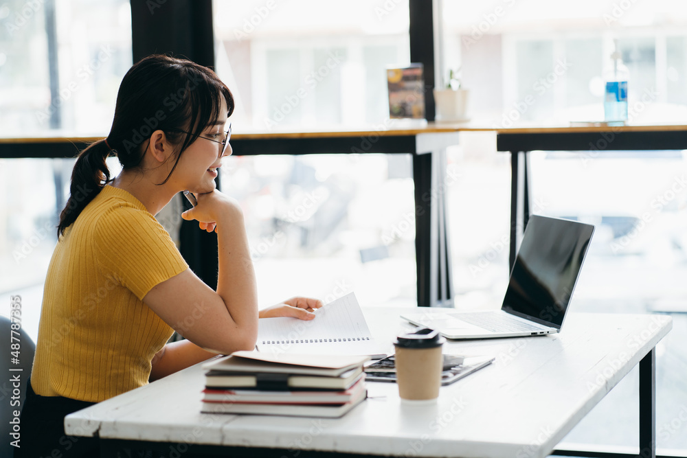 Skilled female software developer working on freelance use code libraries to simplify the transcript