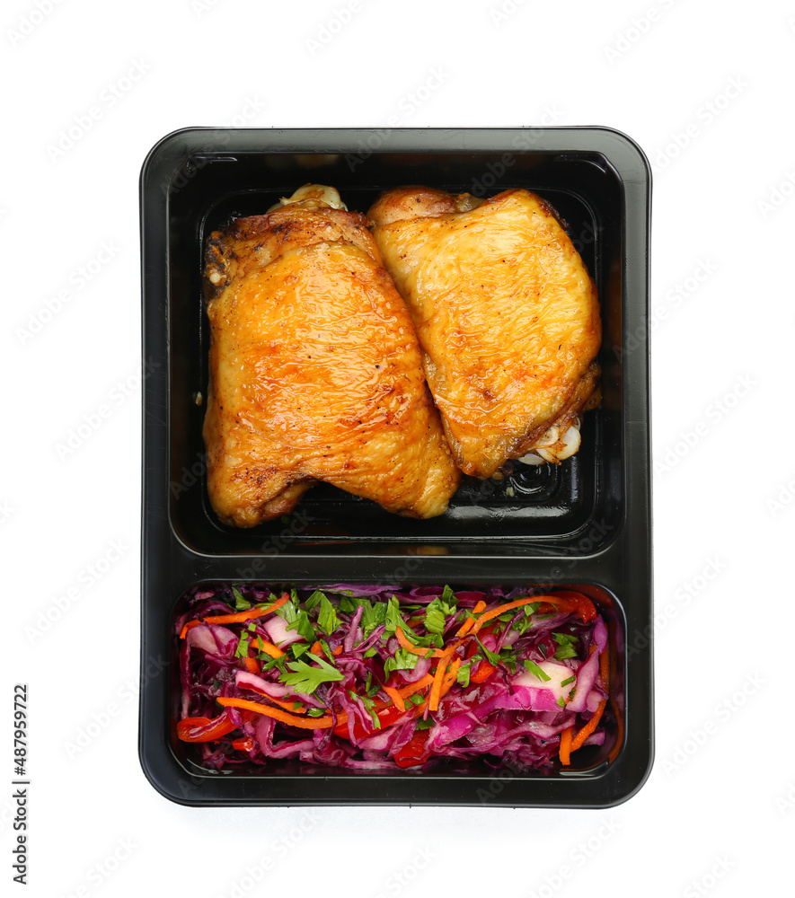 Delicious chicken and fresh salad in lunch box on white background