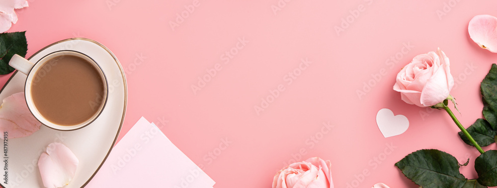 Mothers Day design concept background with pink rose flower and milk tea on pink background.