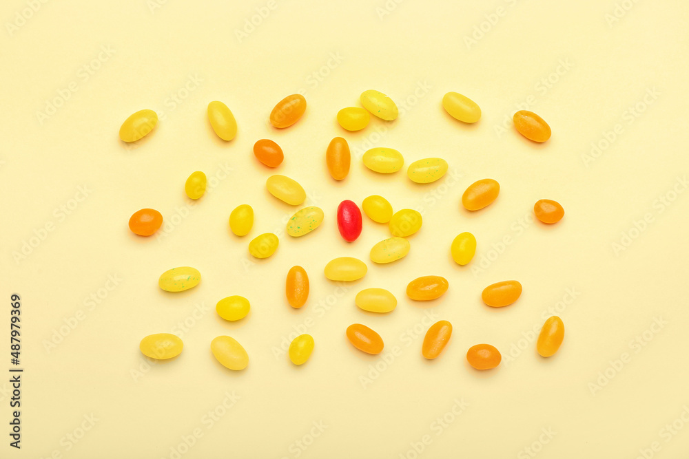 Different jelly beans on beige background