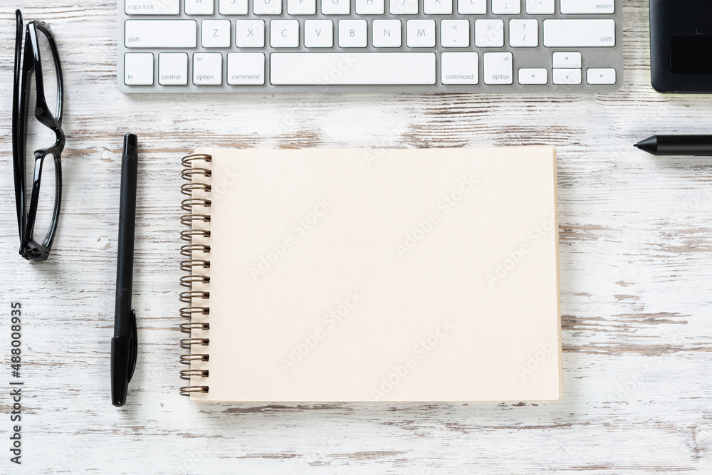 Still life of office workspace with cup of coffee