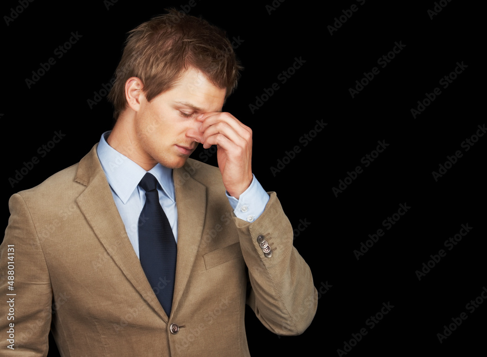 Stressed out business man over black background. Stressed out young business man over black backgrou