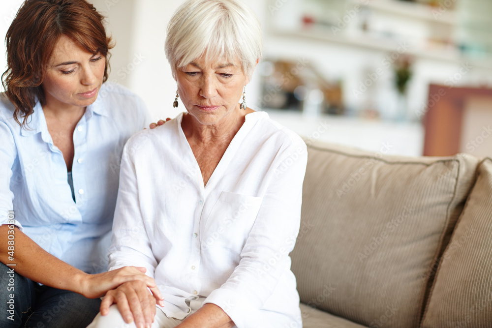 Im here for you whenever you need me. Shot of a woman supporting her elderly mother through a diffic