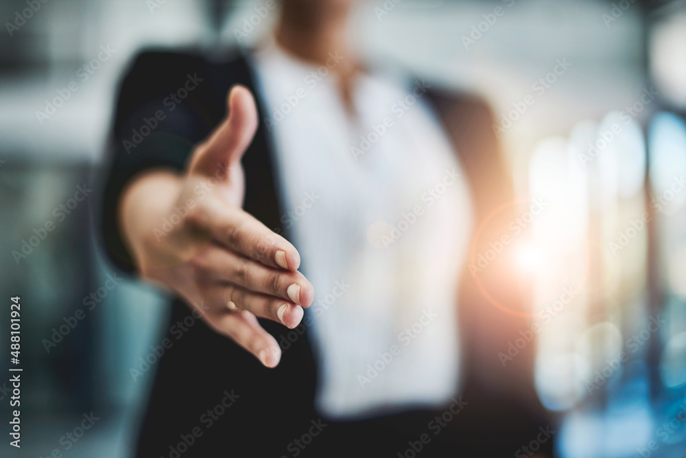 Youre going to love working here. Cropped shot of an unidentifiable businesswoman extending her arm 