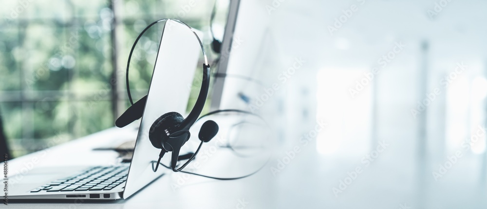 Headset and customer support equipment at call center ready for actively service . Corporate busines