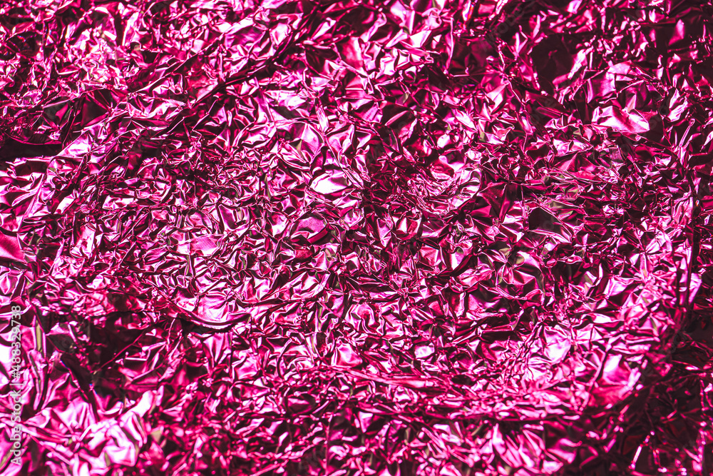 Texture of shiny color foil, closeup