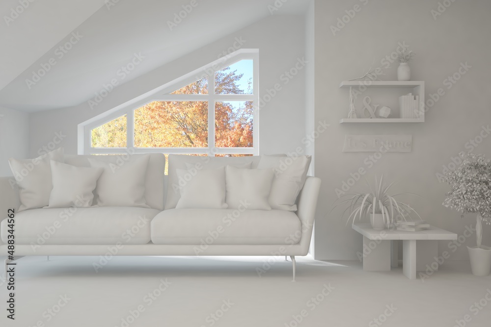 Stylish room in white color with sofa and autumn landscape in window. Scandinavian interior design. 