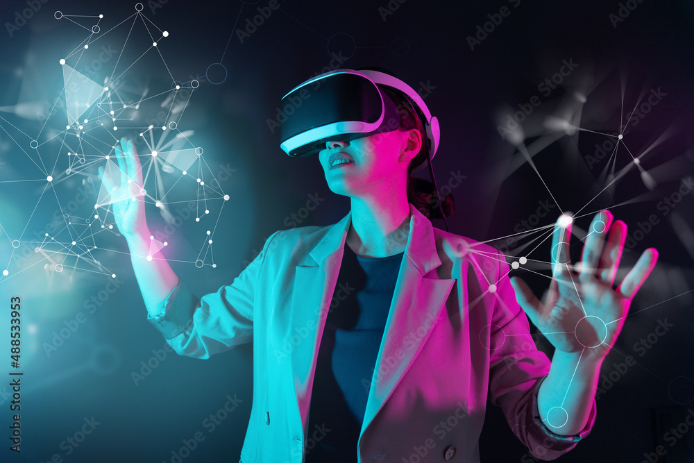 Woman with VR virtual reality goggles