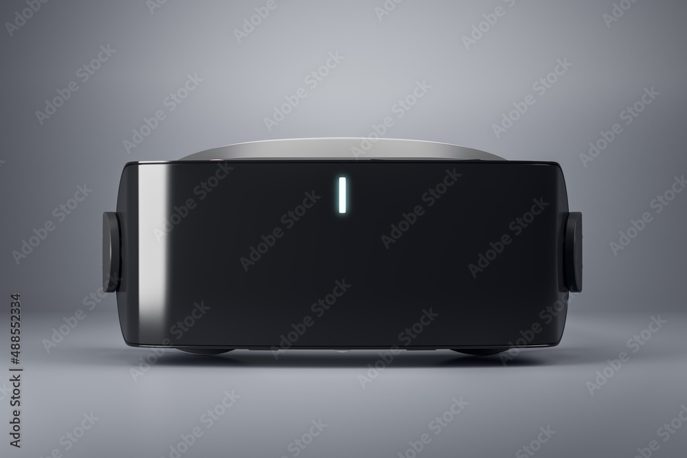 Close up of creative virtual reality glasses on abstract blurry background with blank mock up place 