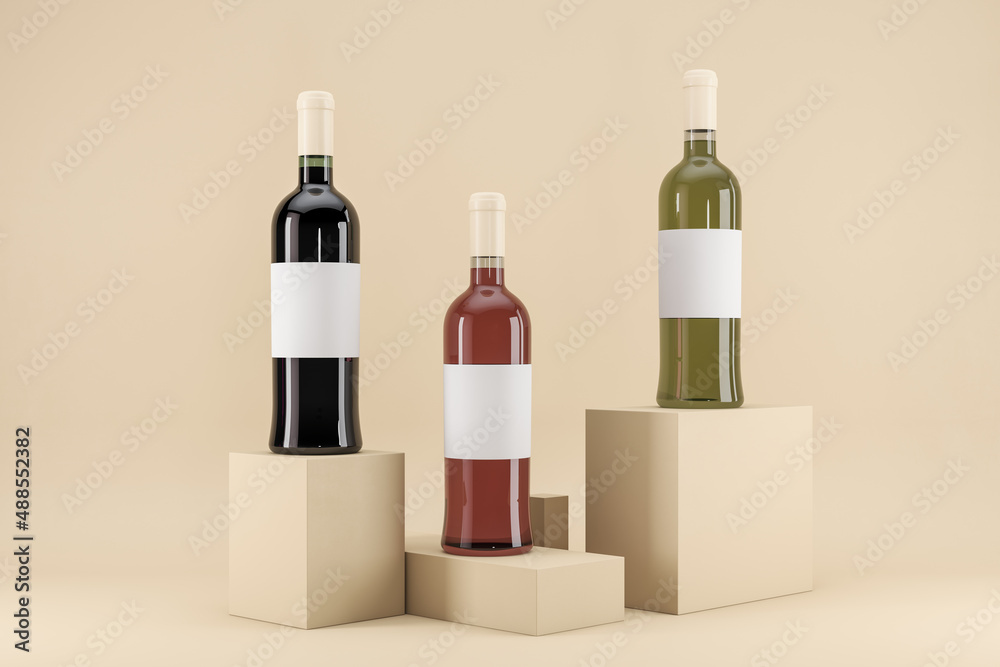 Three wine bottles in the center of beige background on small light stages with blank white labels w