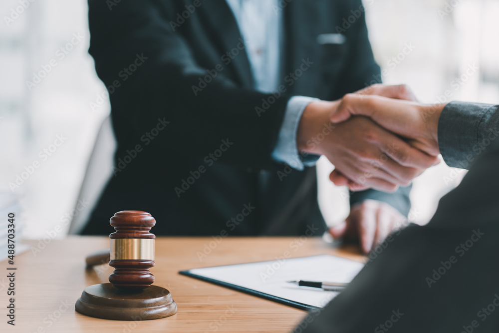 Lawyer business women shaking hands with clients, after finishing up a Consulting for insurance rent