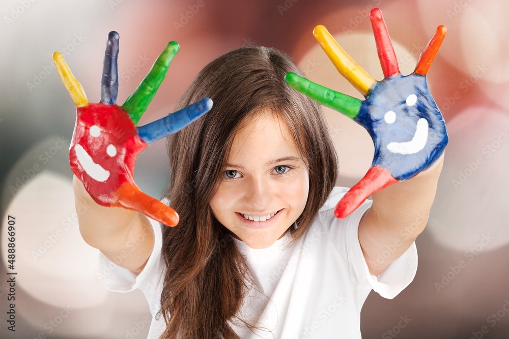 Little beautiful girl with painted hands