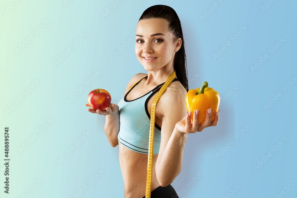 Young happy strong sporty fitness trainer instructor woman. Workout sport concept