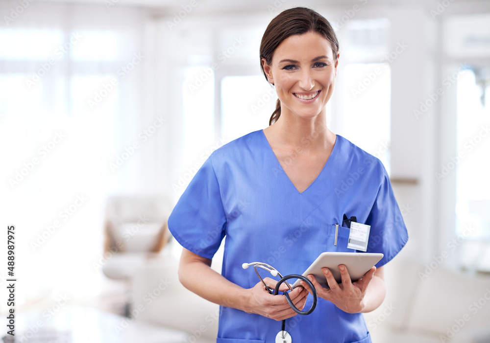 Healing with a little tech help. Cropped shot of a young female doctor holding a tablet.