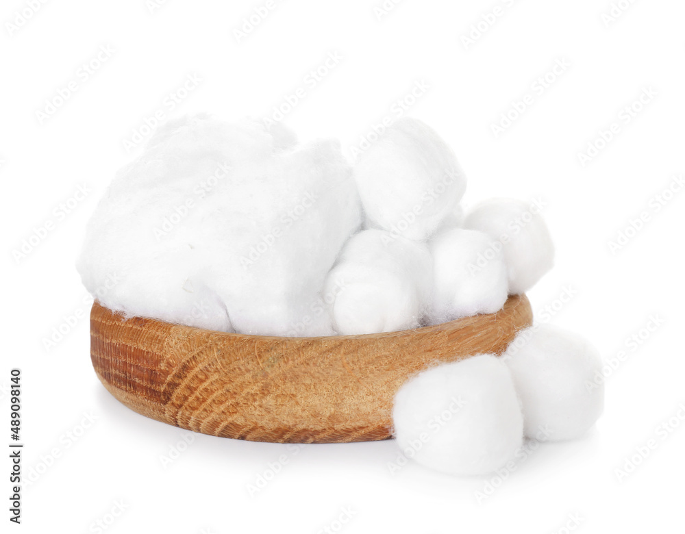 Wooden bowl with soft cotton wool isolated on white background