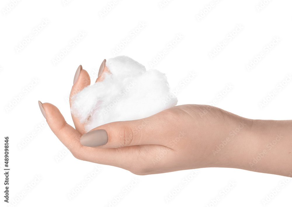 Female hand with clean cotton wool on white background, closeup