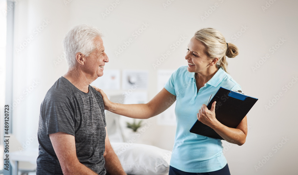 Ill have you back to 100 in no time. Cropped shot of a mature female physiotherapist working with a 