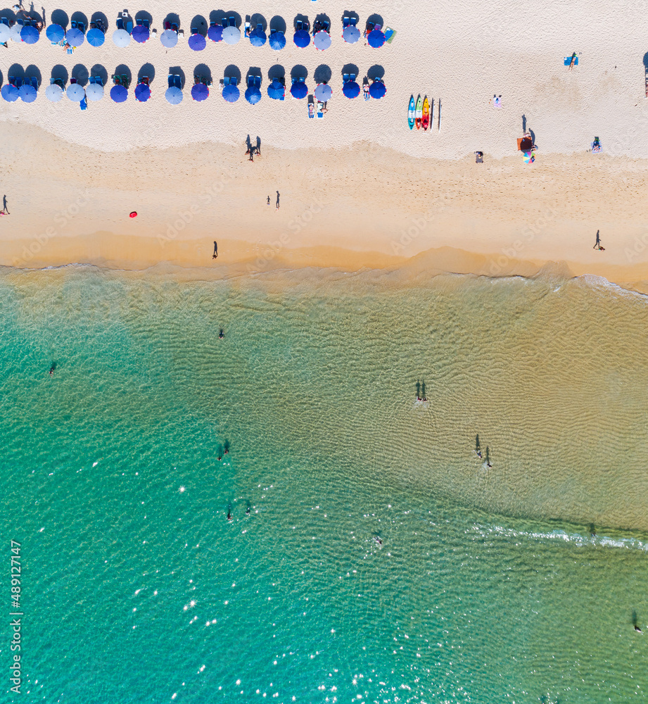 Aerial view Amazing sandy beach and small waves Beautiful tropical sea in the morning summer season 