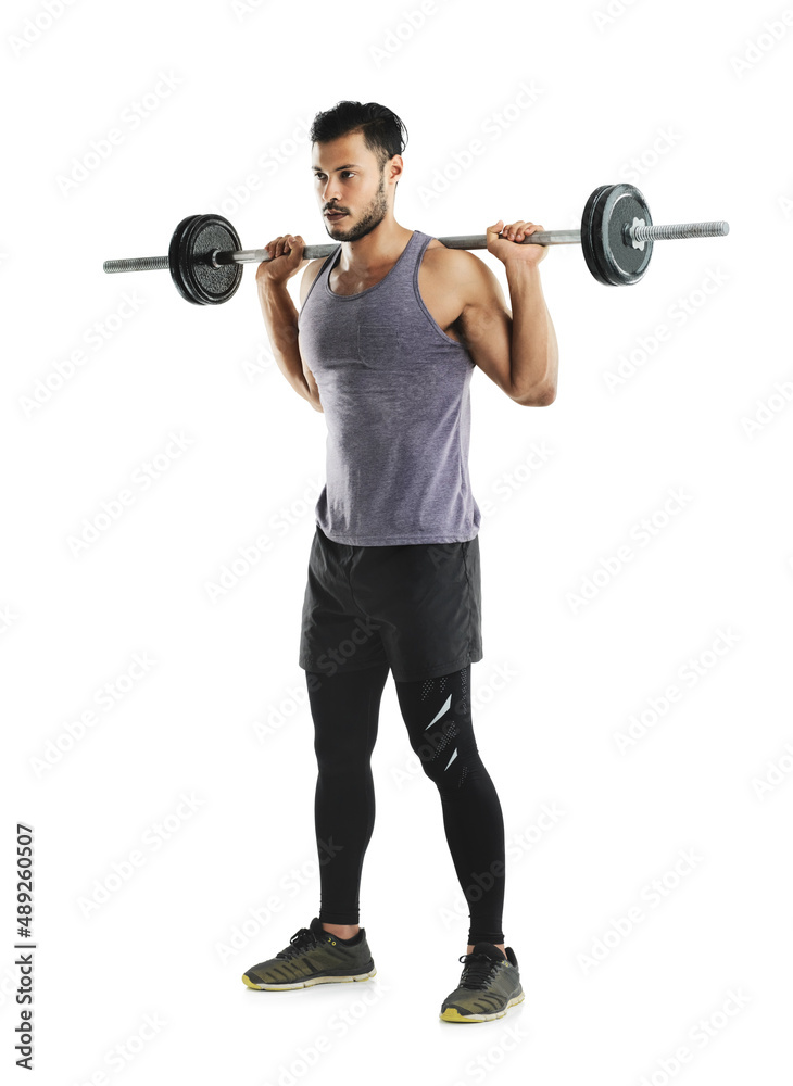 Weights and willpower. Studio shot a young man working out with a barbell against a white background