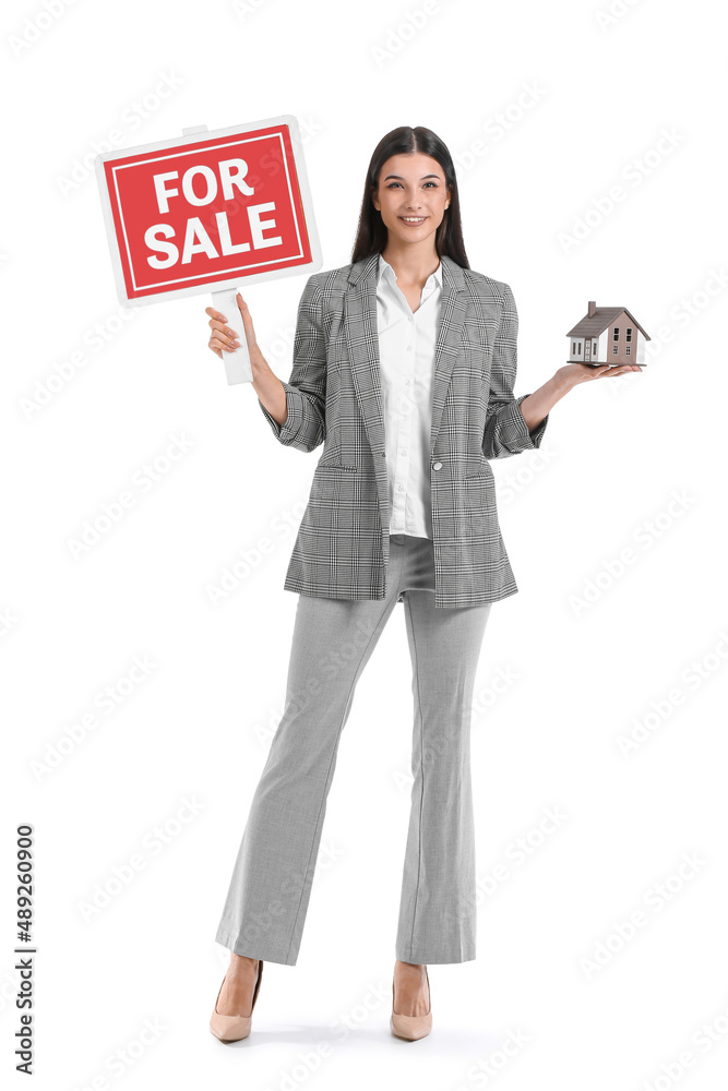 Female real estate agent with For Sale