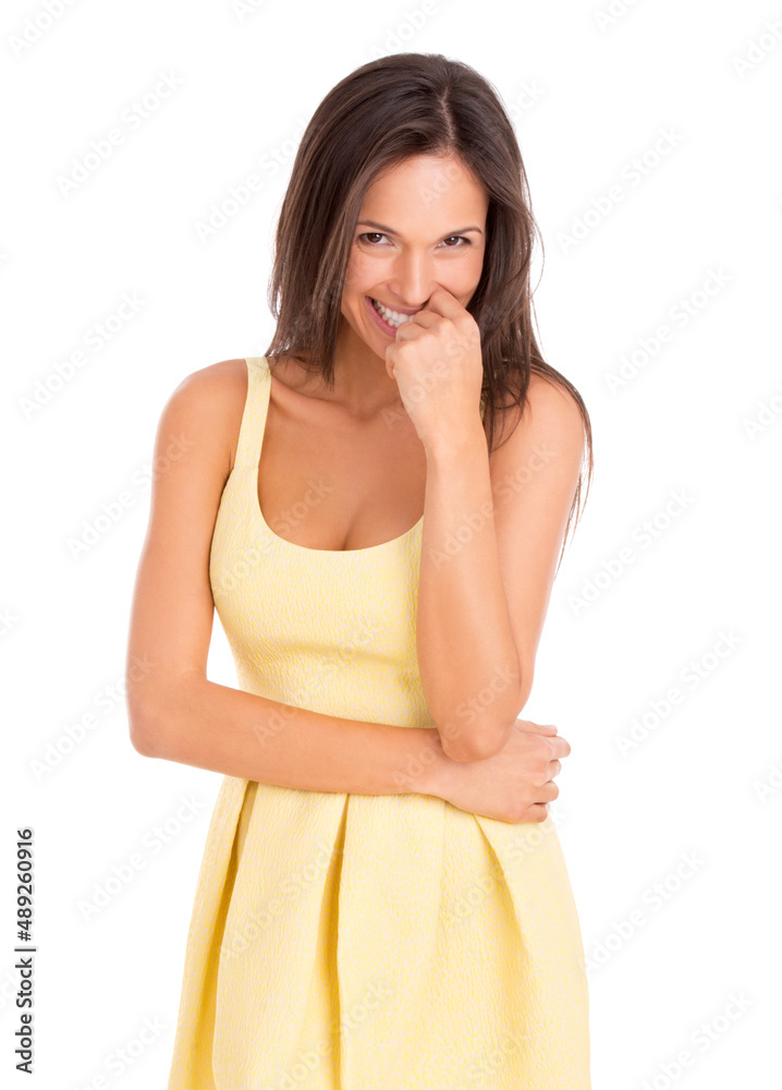 Looking stylish for spring. Studio portrait of a beautiful young woman posing in a yellow dress.