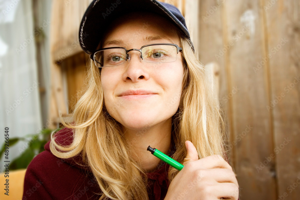 I should be writing, but you intrigue me.... A cute young student looking natural while waiting for 