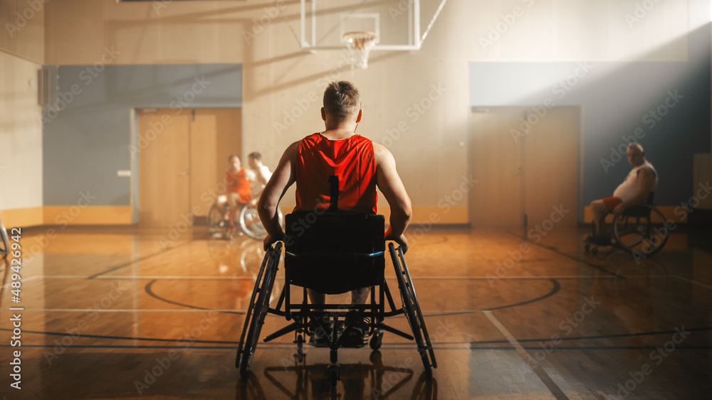 Wheelchair Basketball Game: Professional Player Prepairing to Play. He is Ready to Compete, Dribble 