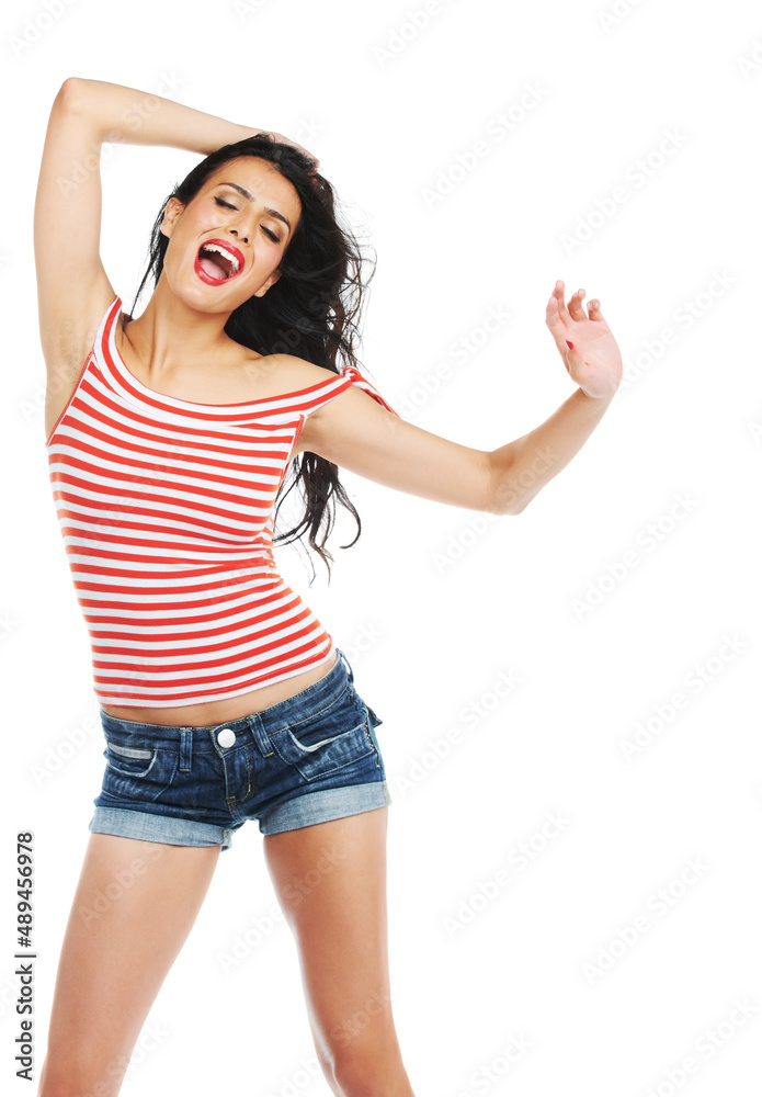 Having a laugh. Studio shot of an attractive young woman having fun against a white background.