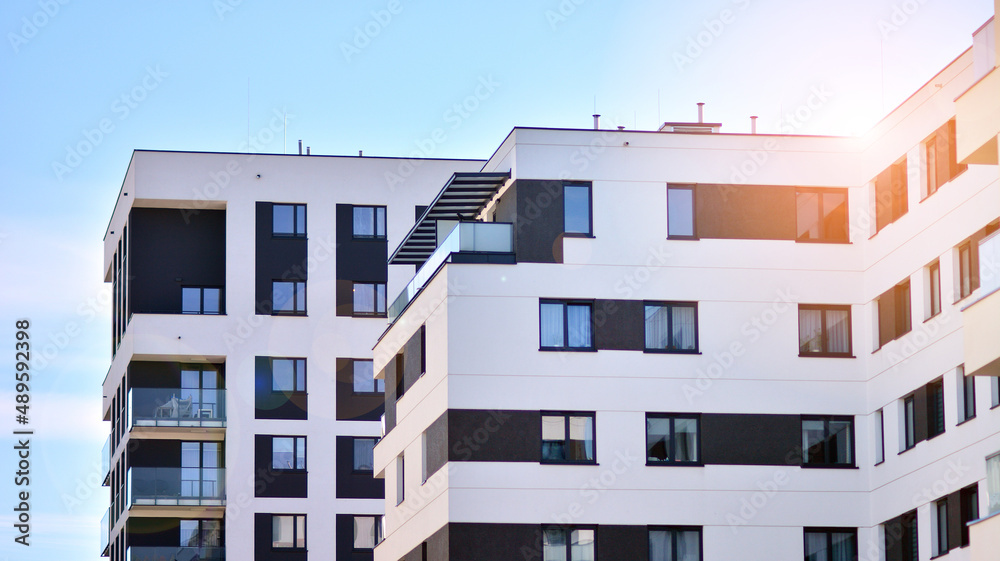 Fragment of modern residential apartment with flat buildings exterior. Detail of new luxury house an