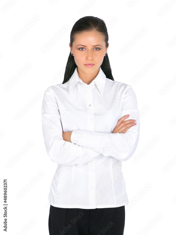 Serious about business. Portrait of an attractive businesswoman looking serious against a white back