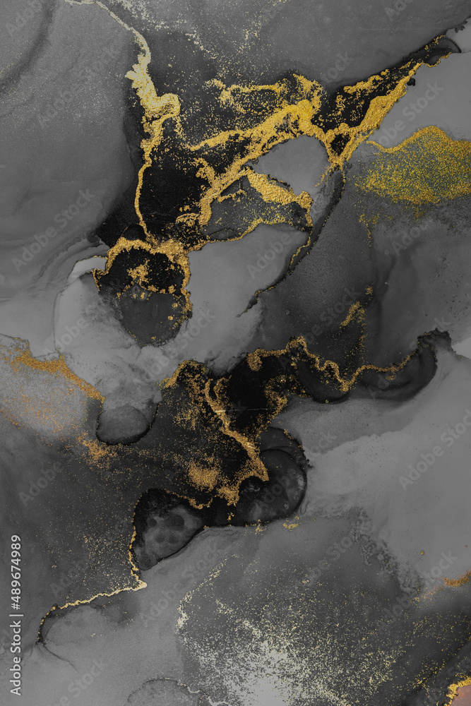 纸上大理石液体水墨艺术画的暗金色抽象背景。原始艺术品的图像