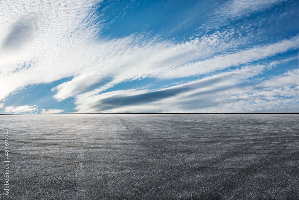 Empty asphalt road ground under blue sky