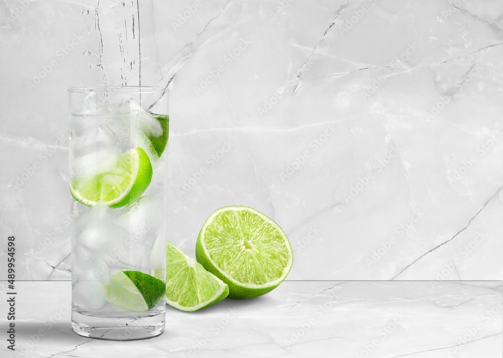 water or tonic cocktail with ice and lemon