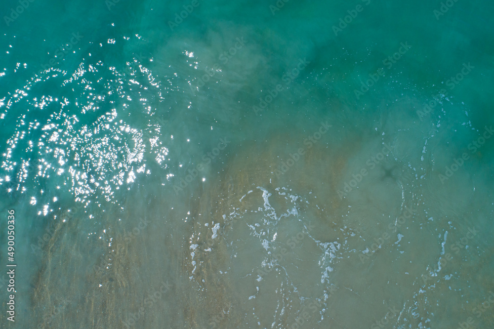 Sea surface aerial view,Bird eye view photo of small waves and water surface texture Turquoise sea b