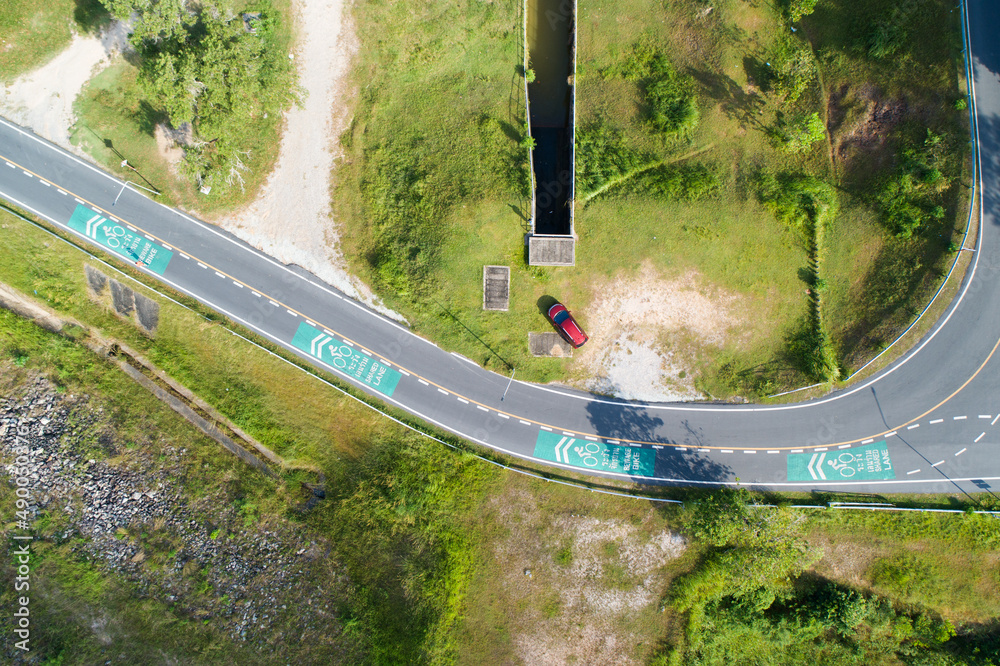 Aerial view top down photo from flying drone of asphalt road and bicycle lane