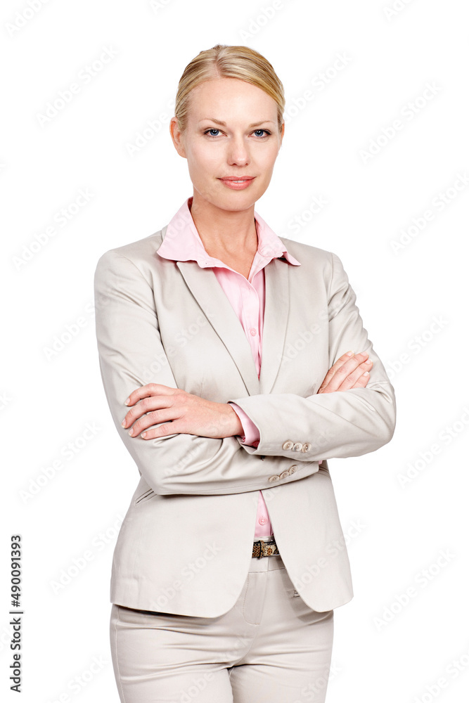 Shes all about business. Studio portrait of a businesswoman standing with her arms folded against a 