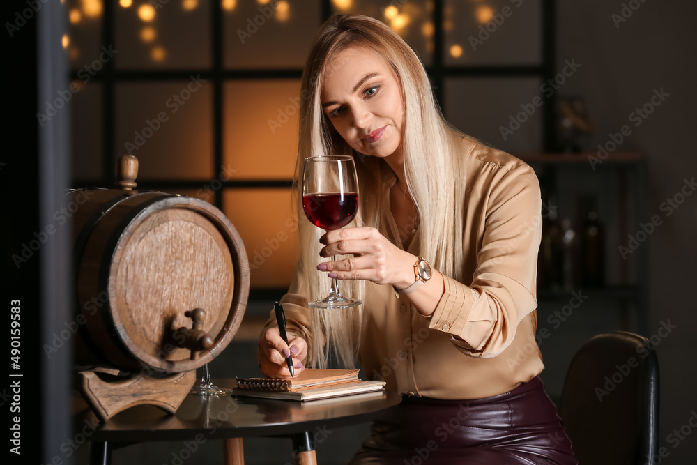 Female sommelier tasting types of wine