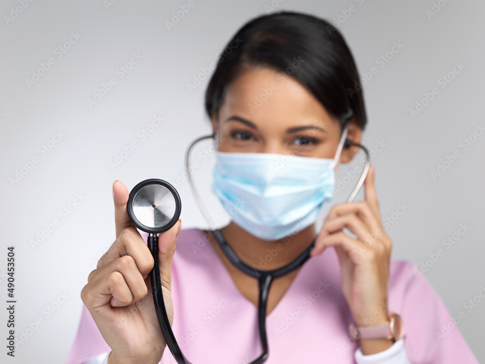 Youve got a strong heart. Cropped portrait of an attractive young female healthcare worker wearing a