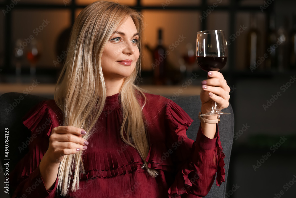 Female sommelier tasting types of wine