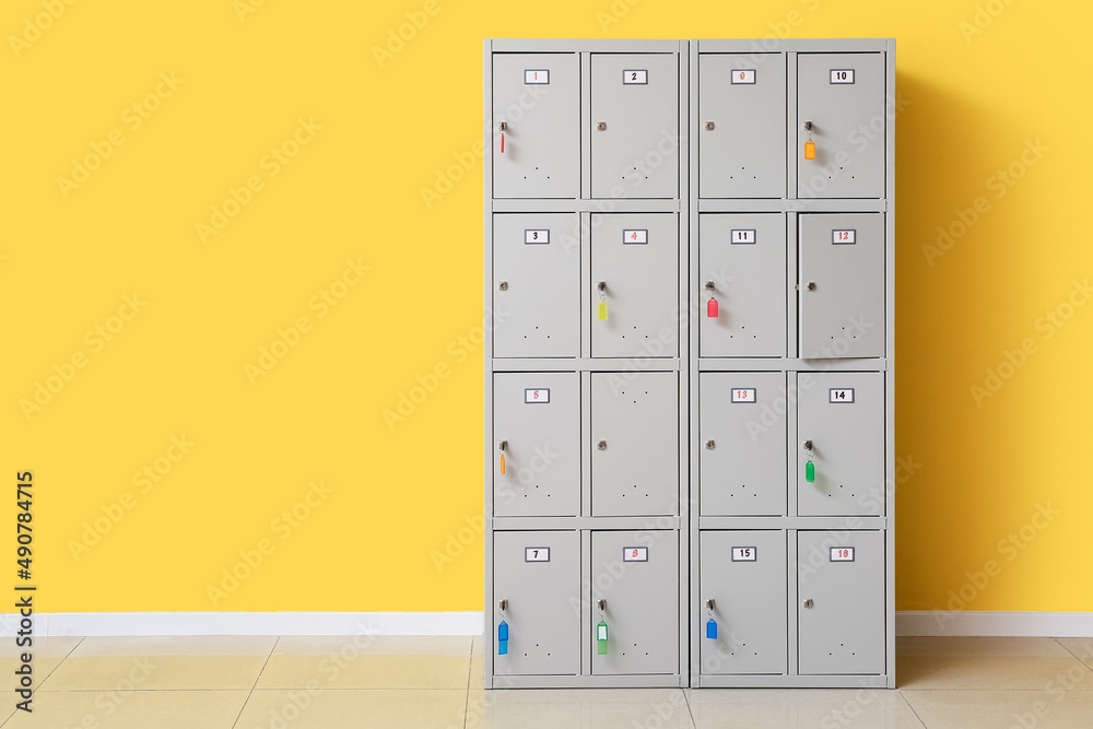 Modern locker near yellow wall