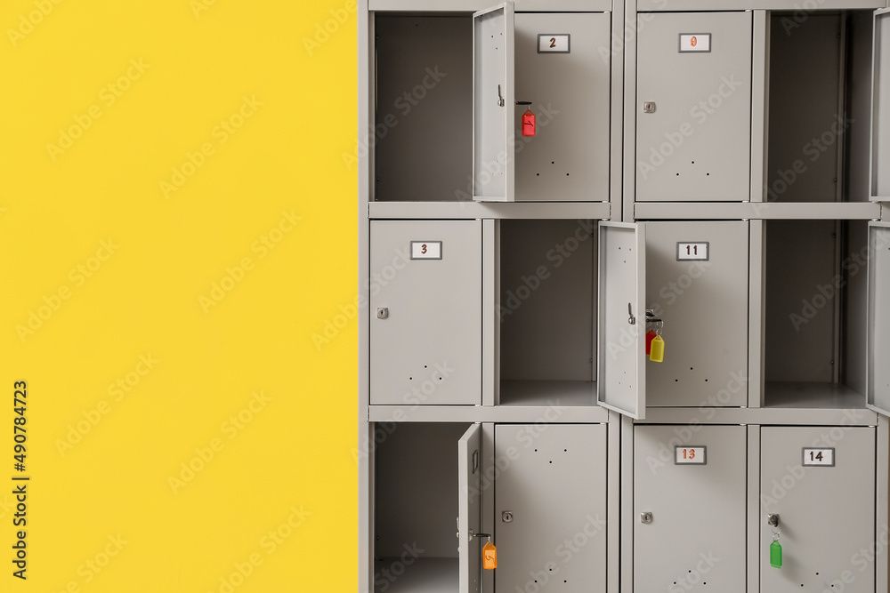 Modern locker near yellow wall