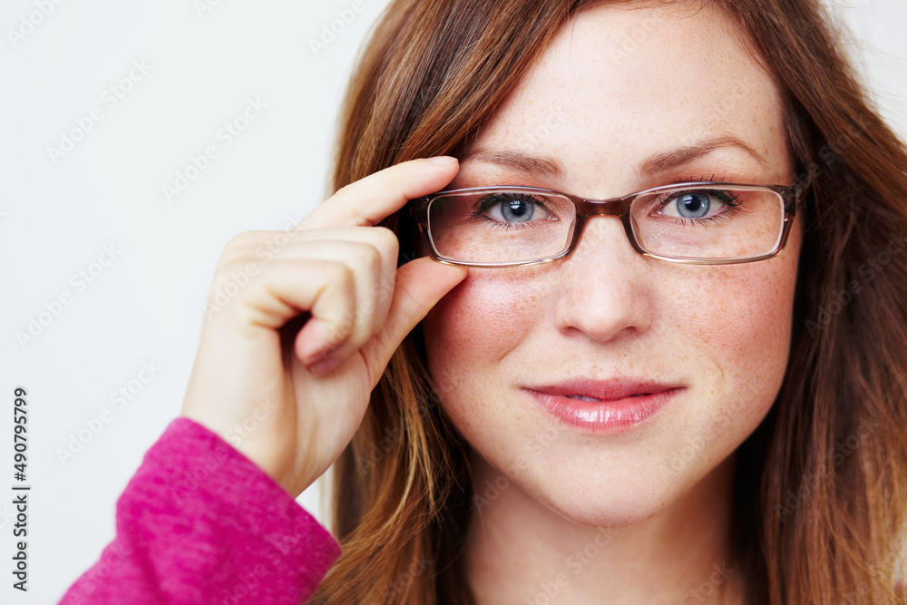 Intellectual and beautiful. Portrait of an attractive young woman weering glasses.