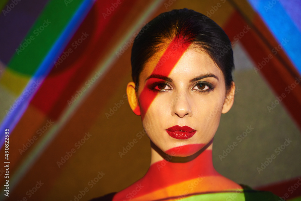 I dont do fashion I am fashion. A beautiful model in the studio covered with a myriad of abstract li